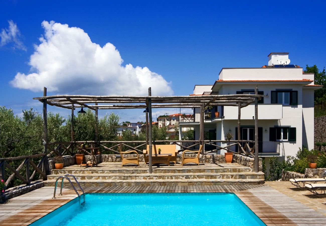 sunny day, pool and solarium, holiday apartment turandot, sant’agata sui due golfi, italy